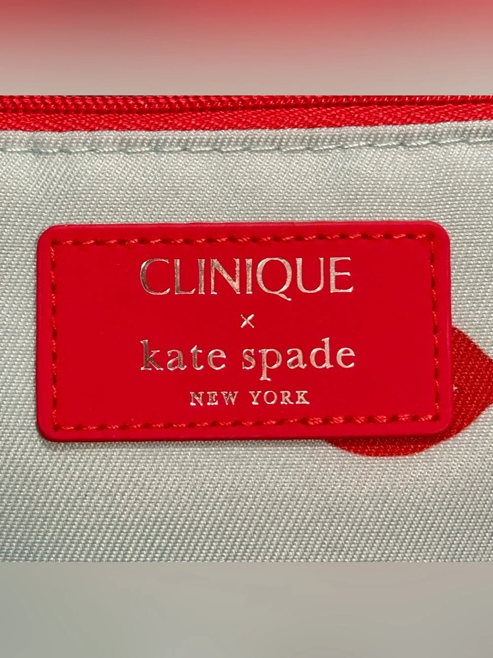 Clinique x kate spade Mint Cosmetic Pouch with Red Lip Print